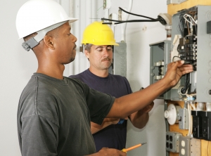 A teacher and student in an electrical trade class